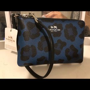 Brand new coach clutch/wristlet